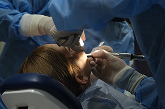Woman getting dental procedure