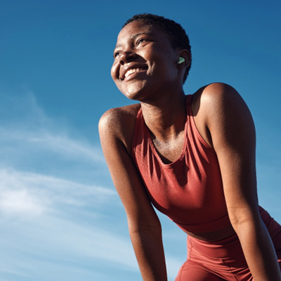 Lady smiles outdoors
