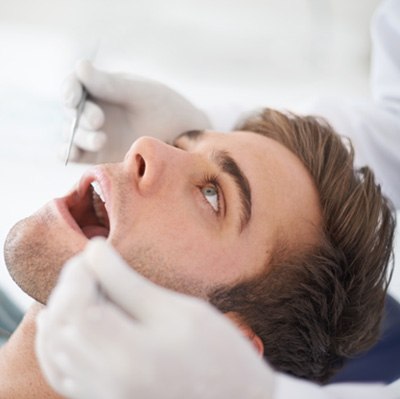 Young man undergoing a dental checkup 